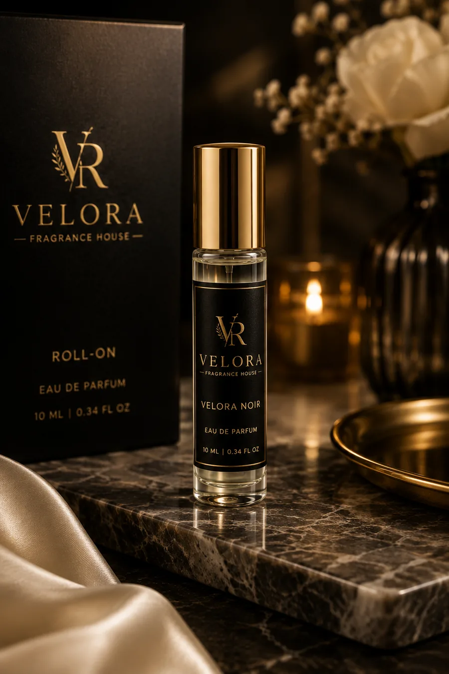 Velora Noir roll-on eau de parfum, 10 ml, with gold cap and black and gold box